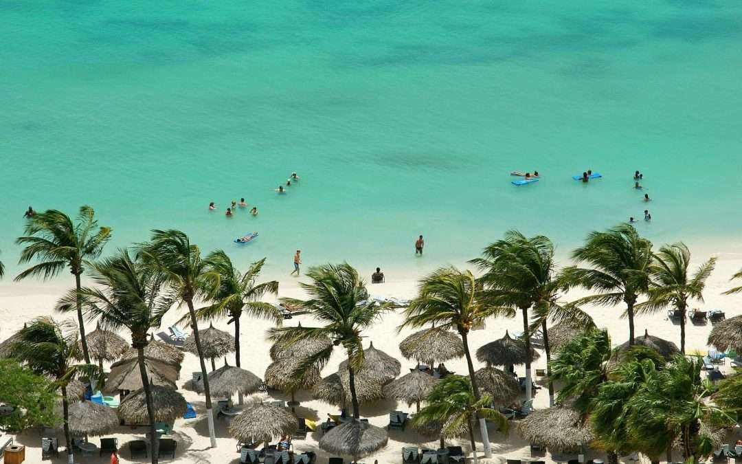 Busy beach with cabanas