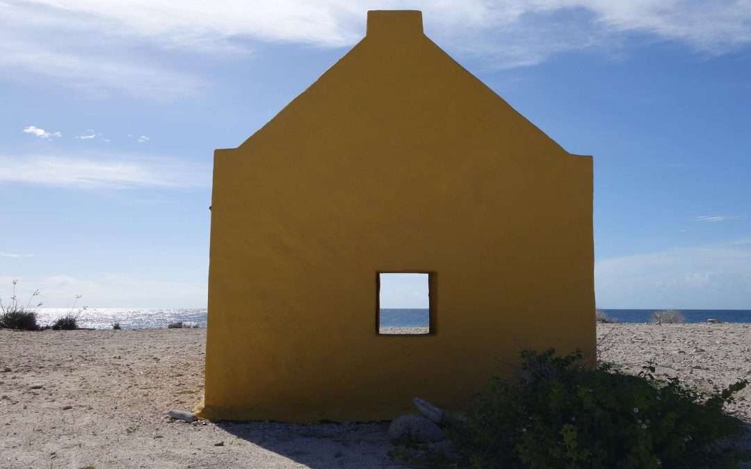 Side of yellow slave hut bonaire