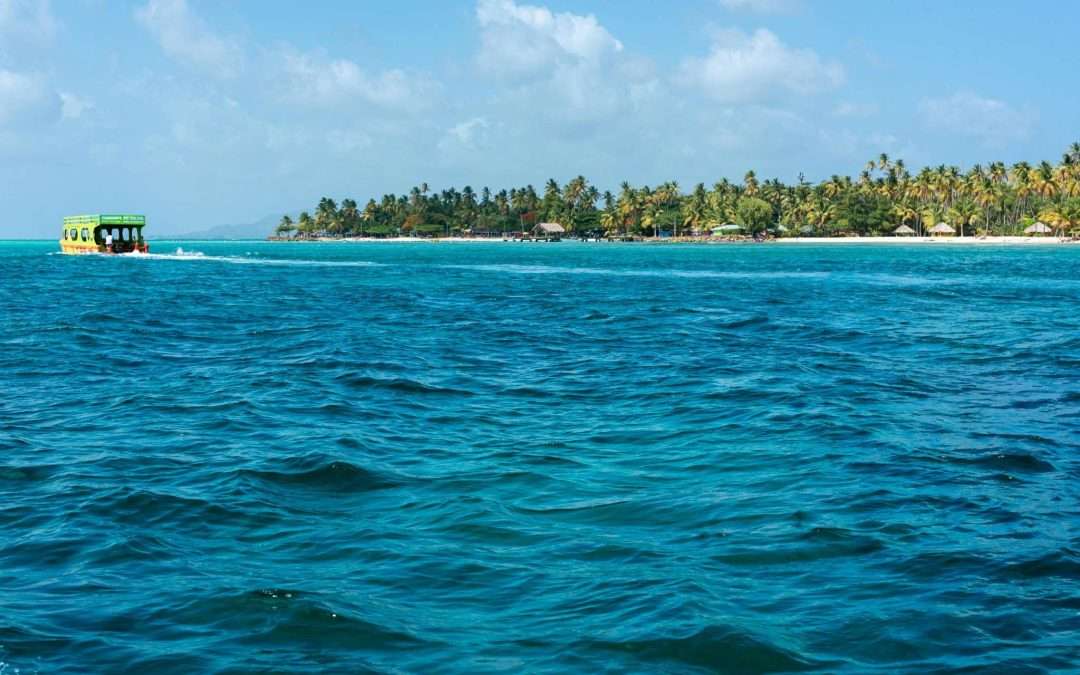 island shoreline blue ocean water